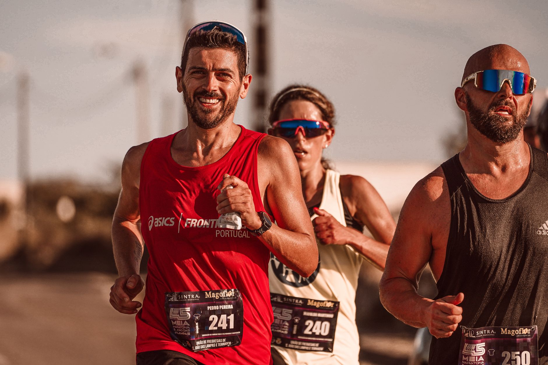Runners in golden light